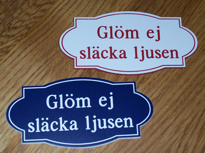 En skylt med texten Glöm ej att släcka ljusen